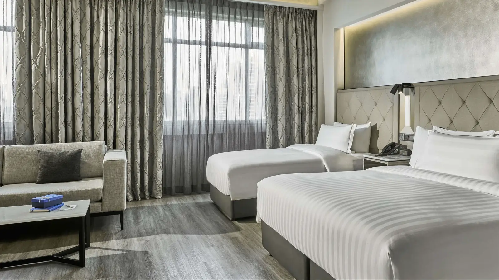 family triple room with 1 king bed and 1 single bed