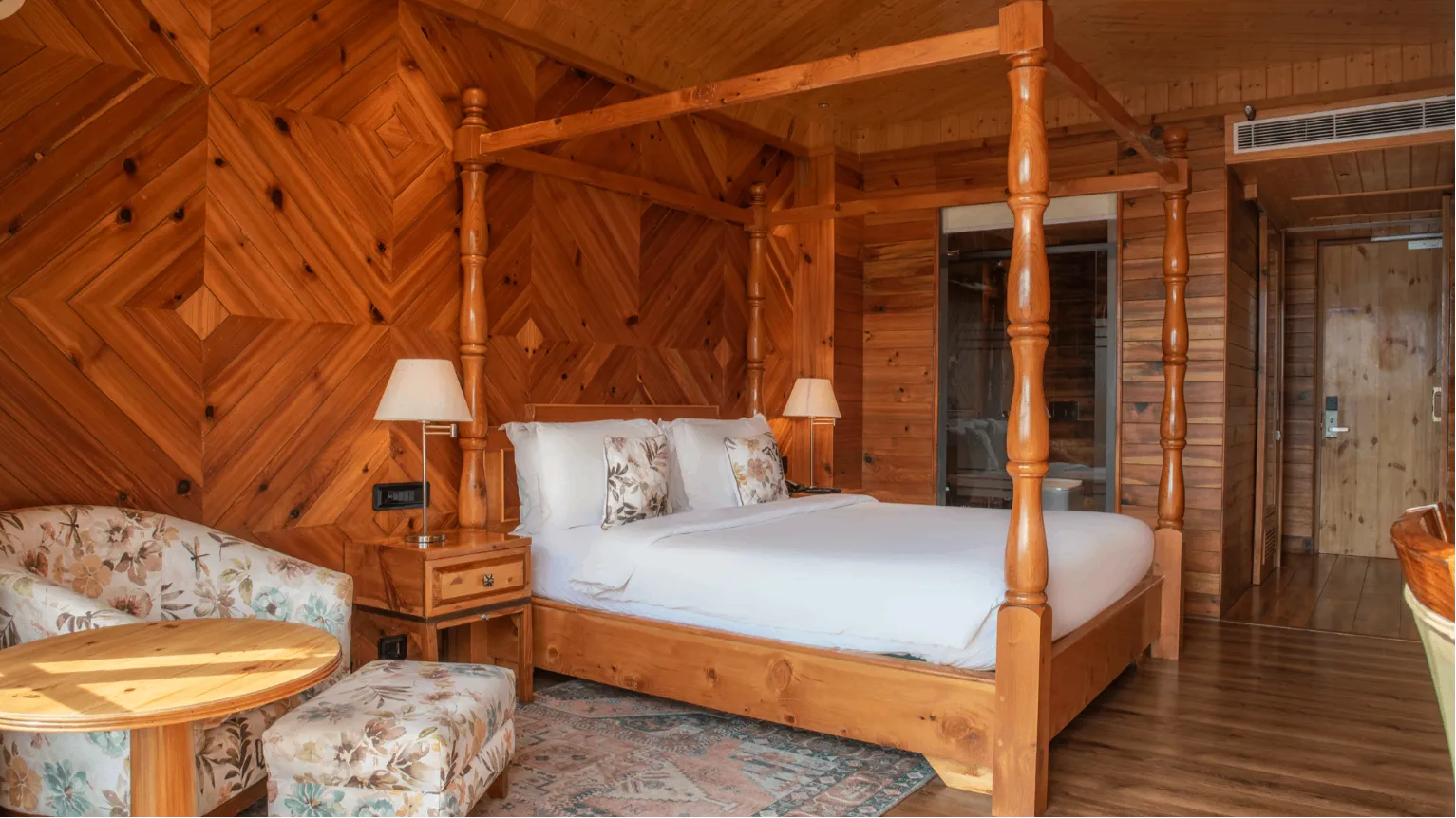 Swiss Chalet 4 Poster Bedroom with a four-poster bed and mountain view